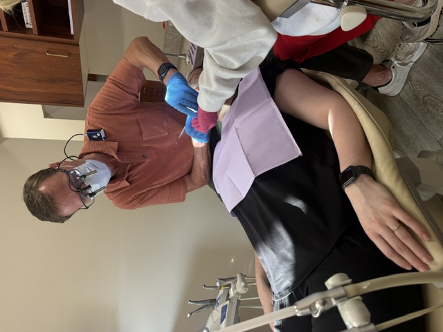 Dr. Bartels works with dental patient