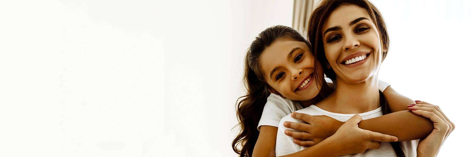 Child hugging her mother